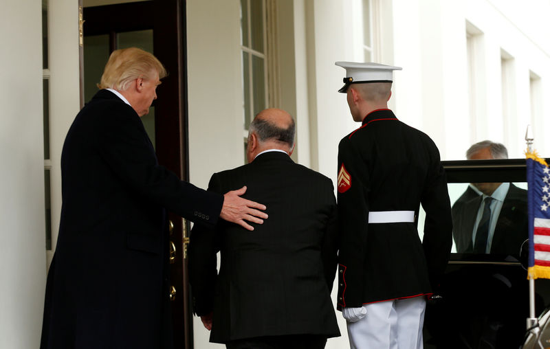 U.S. President DONALD TRUMP greets Iraqi Prime Minister Haider al-Abadi at the White House in Washington