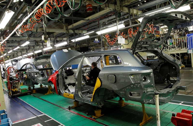 © Reuters. A man works on the production line at the Toyota factory in Derby