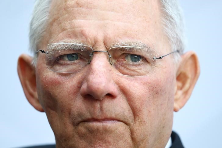 © Reuters. German Finance Minister Wolfgang Schaeuble talks to reporters during the G20 Finance Ministers and Central Bank Governors Meeting in Baden-Baden