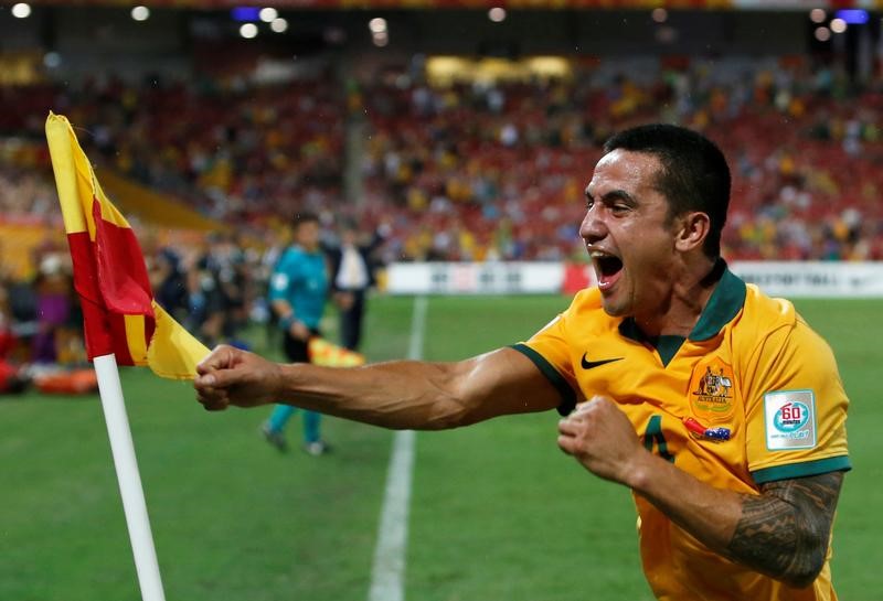 © Reuters. FILE PHOTO: Australia's Tim Cahill celebrates his second goal during their Asian Cup quarter-final soccer match against China at the Brisbane Stadium in Brisbane