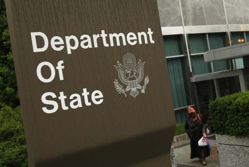 © Reuters. A woman leaves the U.S. State Department building in Washington