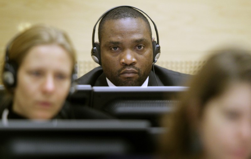 © Reuters. Congolese warlords Germain Katanga sits in the courtroom of the International Criminal Court in The Hague