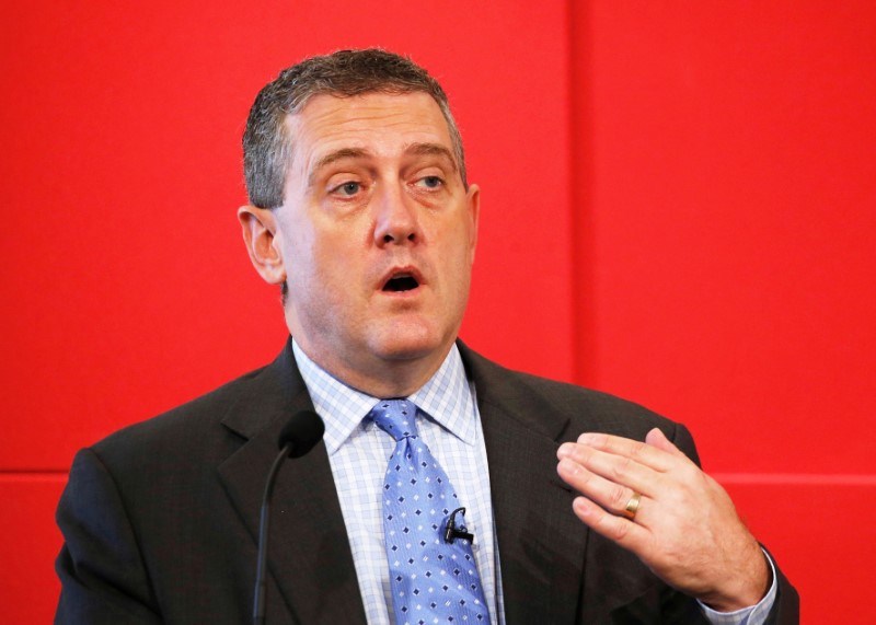 © Reuters. St. Louis Fed President James Bullard speaks at a public lecture on "Slow Normalization or No Normalization" in Singapore