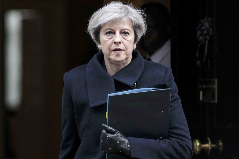 © Reuters. Britain's Prime Minister Theresa May leaves 10 Downing Street the morning after an attack by a man driving a car and weilding a knife left five people dead and dozens injured, in London