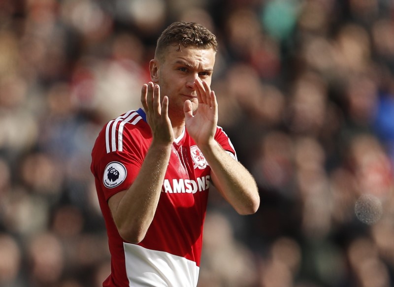 © Reuters. Middlesbrough's Ben Gibson applauds fans after the game