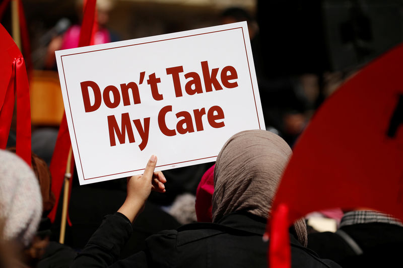 © Reuters. Activists protest against the Republican plan to repeal Obamacare during a rally in Freedom Plaza in Washington