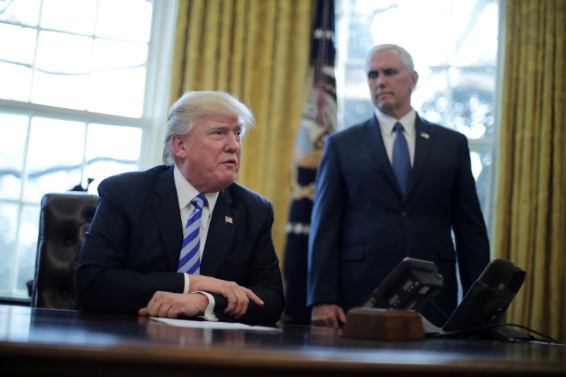 © Reuters. President Trump talks to journalist at the Oval Office of the White House after the AHCA health care bill was pulled before a vote in Washington, U.S.