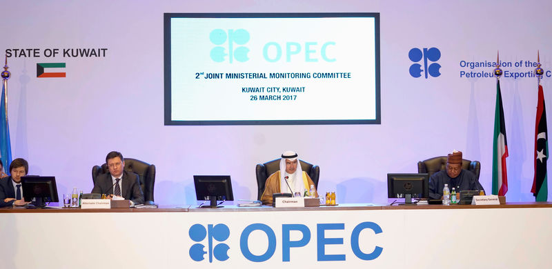 © Reuters. Kuwait Oil Minister Ali Al-Omair gives his opening speech during OPEC 2nd Joint Ministerial Monitoring Committee meeting as Russian Energy Minister Alexander Novak and OPEC Secretary General Mohammad Barkindo attend the meeting in Kuwait City