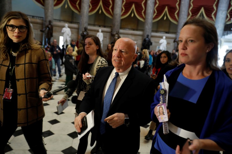 © Reuters. House Ways and Means Chairman Rep. Kevin Brady (R-TX) leaves the office of Speaker Paul Ryan ahead of a crucial vote on the Affordable Care Act at the Capitol Building in Washington