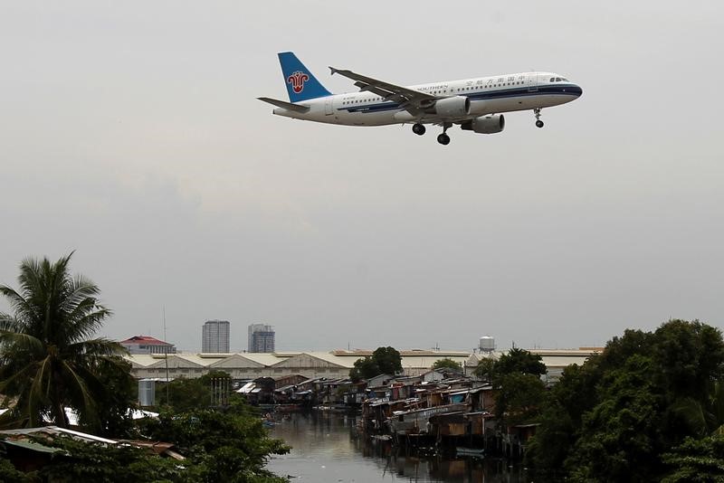 © Reuters. China Southern negocia posible acuerdo con American Airlines