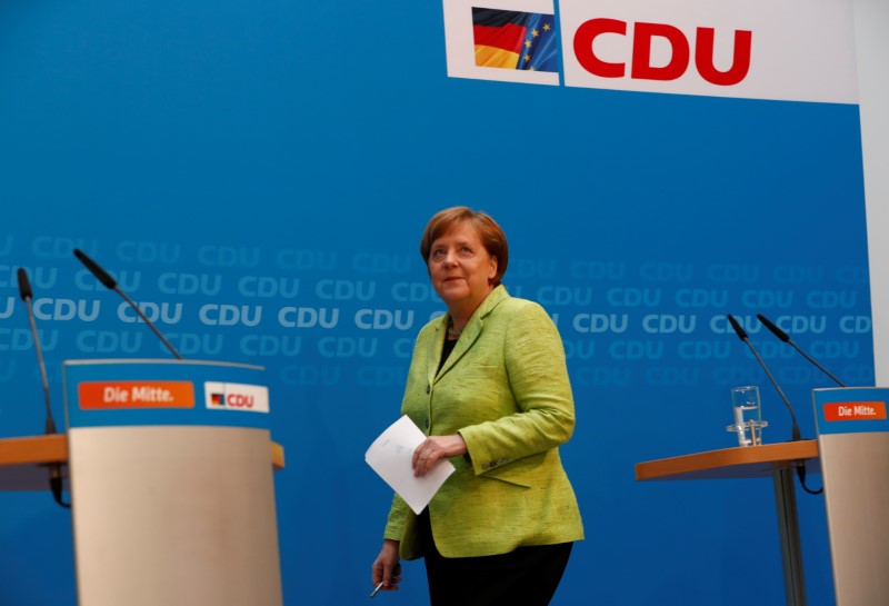 © Reuters. Reactions after Saarland state elections in Berlin