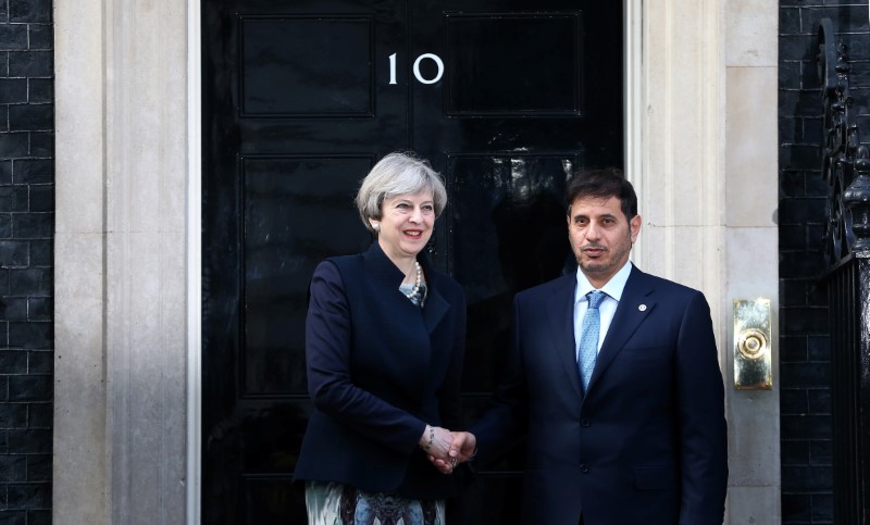 © Reuters. ماي: بريطانيا وقطر تشكلان لجنة مشتركة تمهيدا لاتفاق تجاري بعد الانفصال