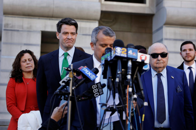 © Reuters. Former deputy executive director of the Port Authority of New York and New Jersey, Bill Baroni, listens as his lawyer speaks following his sentencing in the Bridgegate trial at the Federal Courthouse in Newark