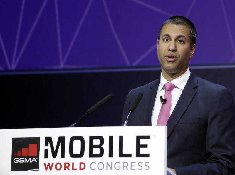 © Reuters. Pai, Chairman of U.S Federal Communications Commission, delivers his keynote speech at Mobile World Congress in Barcelona
