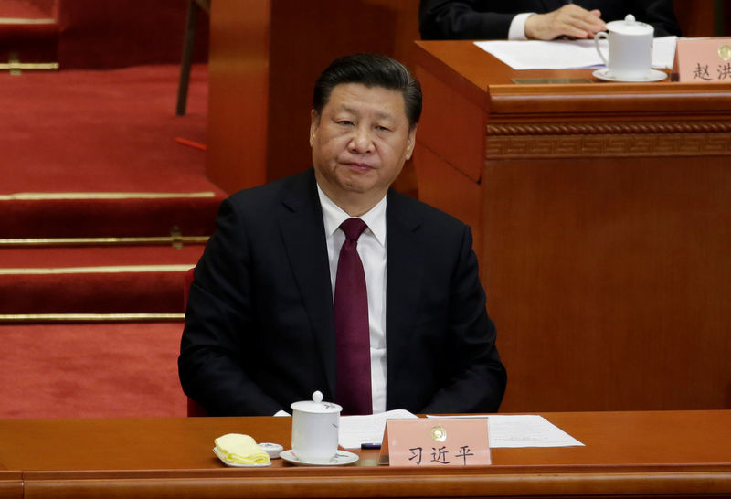 © Reuters. China's President Xi Jinping attends the opening session of the Chinese People's Political Consultative Conference (CPPCC) at the Great Hall of the People in Beijing