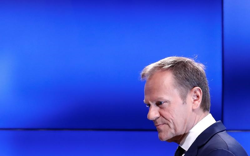 © Reuters. European Council President Donald Tusk arrives at a news conference after receiving British Prime Minister Theresa May's Brexit letter in notice of the UK's intention to leave the bloc under Article 50 of the EU's Lisbon Treaty, in Brussels