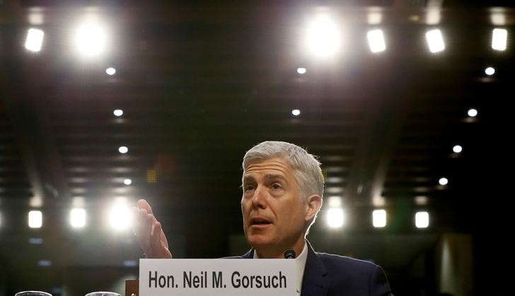 © Reuters. FILE PHOTO - Neil Gorsuch responds to a question during his Senate Judiciary Committee confirmation hearing in Washington