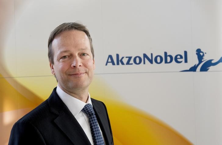 © Reuters. Buchner, CEO of AkzoNobel, poses during a photocall at the presentation of the 2013 full-year results in Amsterdam.