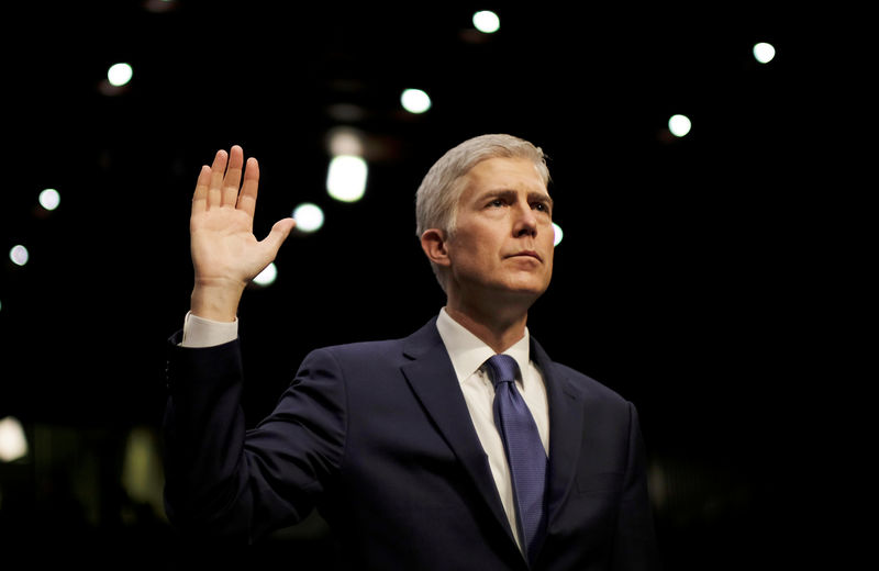 © Reuters. FILE PHOTO - Supreme Court nominee judge Gorsuch sworn in at his Senate Judiciary Committee confirmation hearing in Washington