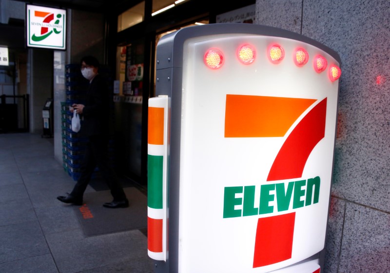© Reuters. A man walks out of Seven & i Holdings Co's Seven Eleven convenience store in Tokyo