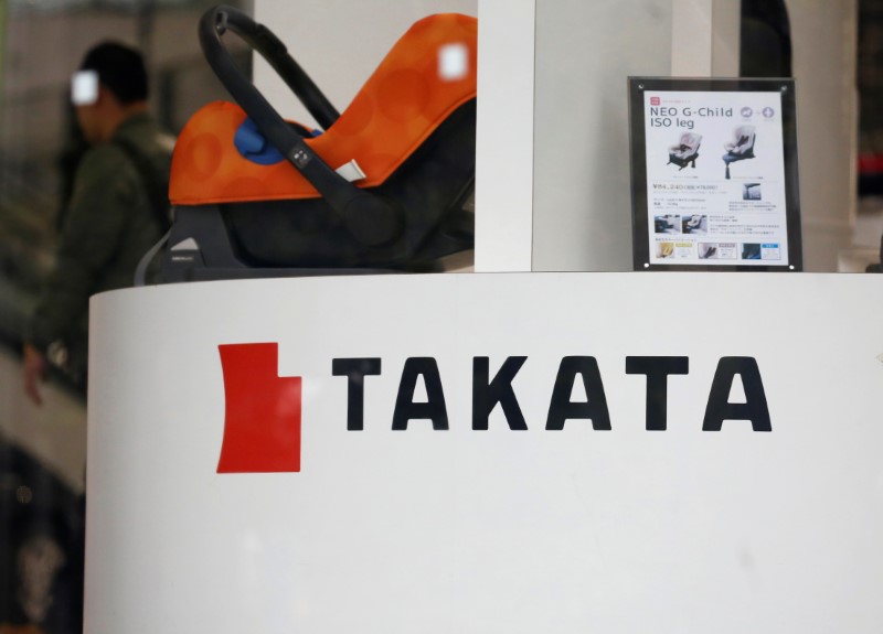 © Reuters. Logo of Takata Corp is seen on its display at a showroom for vehicles in Tokyo