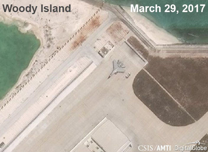 © Reuters. A Chinese J-11 fighter jet is pictured on the airstrip at Woody Island in the South China Sea in this handout satellite photo