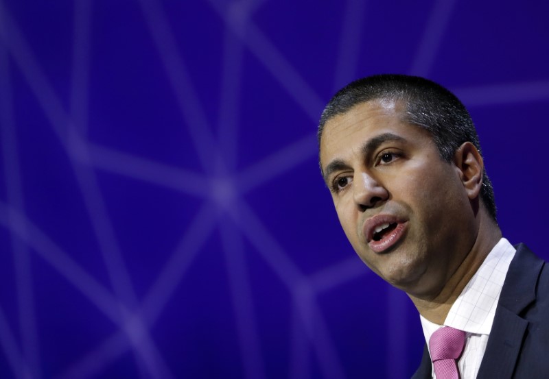 © Reuters. Pai, Chairman of U.S Federal Communications Commission, delivers his keynote speech at Mobile World Congress in Barcelona