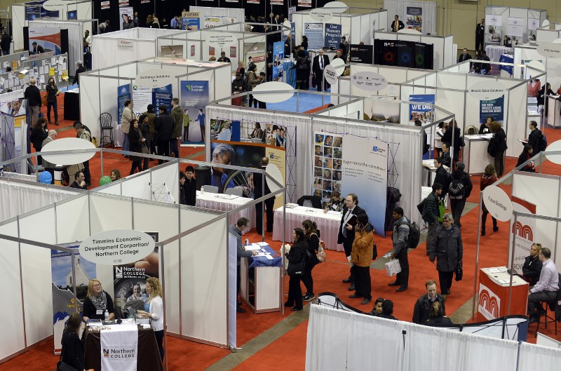 © Reuters. Overhead view of 2014 Spring National Job Fair and Training Expo in Toronto
