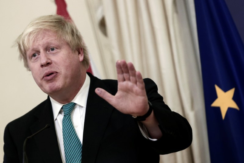 © Reuters. British Foreign Secretary Johnson answers a question during a joint press conference with Greek Foreign Minister Kotzias following their meeting at the Foreign Ministry in Athens