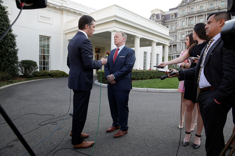 © Reuters. White House Press Secretary Sean Spicer apologizes during an interview for saying Adolf Hitler did not use chemical weapons, at the White House in Washington