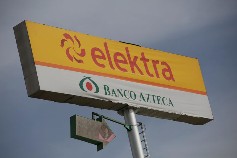 © Reuters. Sign of a store of banking and retail company Elektra is pictured  in Ciudad Juarez