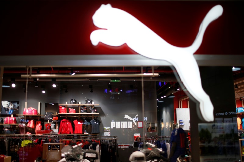 © Reuters. Logo of Puma sportswear company is seen at its store at Tbilisi Mall in Tbilisi