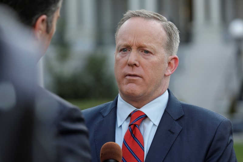 © Reuters. White House Press Secretary Sean Spicer apologizes during an interview for saying Adolf Hitler did not use chemical weapons, at the White House in Washington