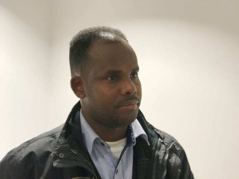 © Reuters. Abdi Dahir, who moved to Sweden from Somalia as a child and was attacked later in the night after the truck attack, poses for a picture in Stockholm