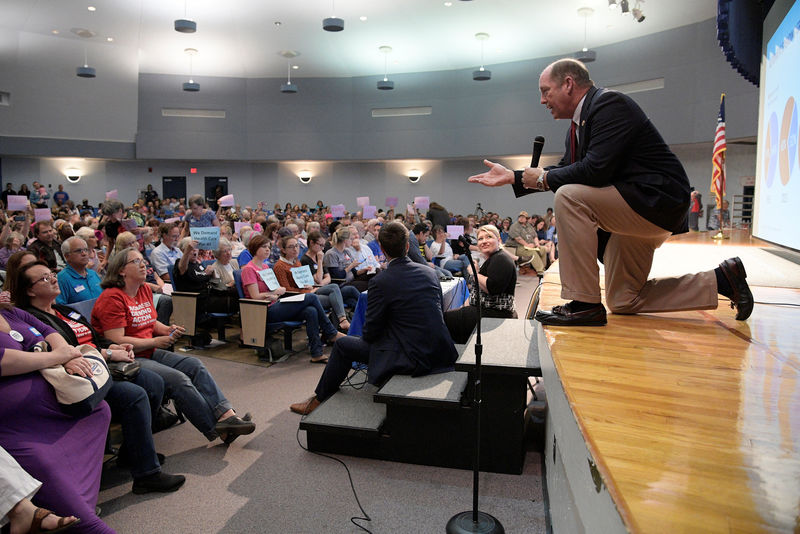 © Reuters. U.S. Representative Ted Yoho answers a question during a town hall meeting in Gainesville