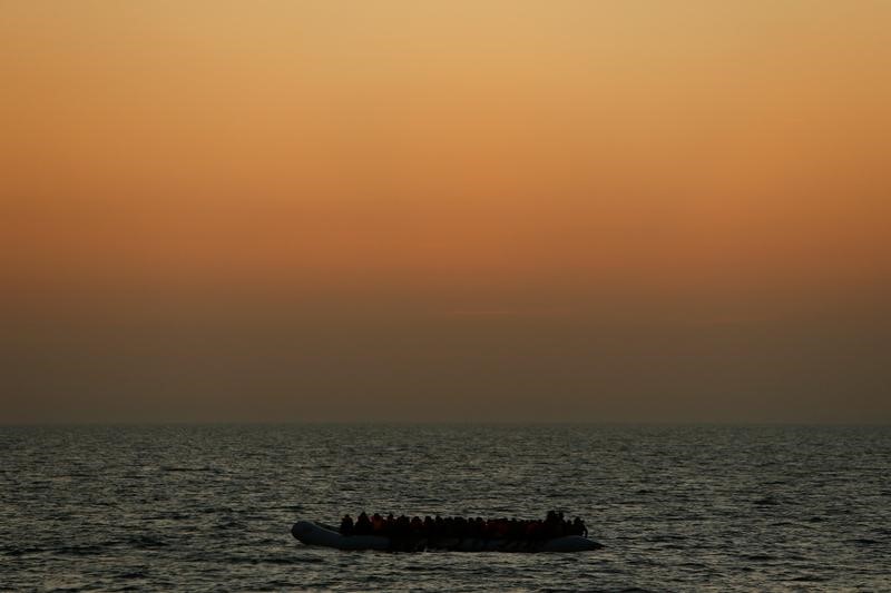 © Reuters. Migrants awaiting rescue on a rubber dinghy are seen from the Malta-based NGO Migrant Offshore Aid Station (MOAS) ship Phoenix in the central Mediterranean in international waters off the coast of Sabratha in Libya