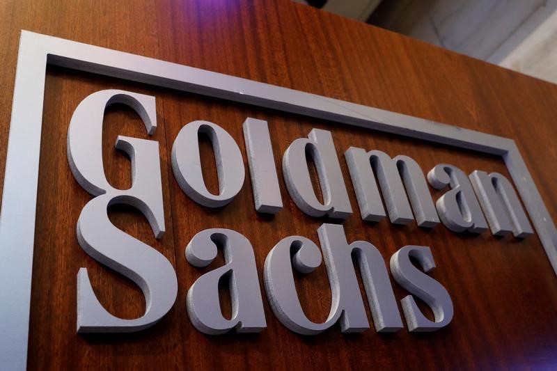 © Reuters. A Goldman Sachs sign is displayed inside the company's post on the floor of the NYSE in New York