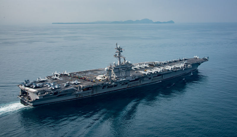 © Reuters. The U.S. aircraft carrier USS Carl Vinson transits the Sunda Strait Indonesia