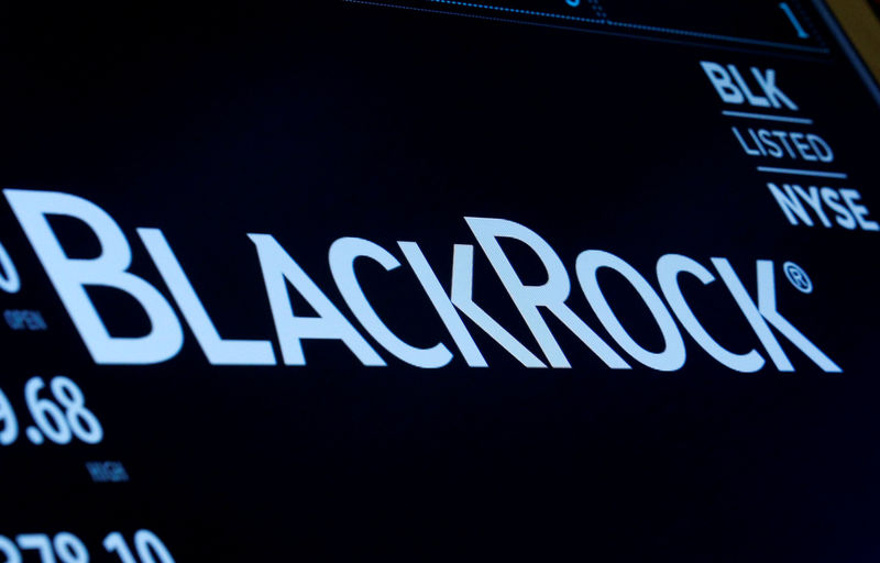 © Reuters. FILE PHOTO: The company logo and trading information for BlackRock is displayed on a screen on the floor of the NYSE