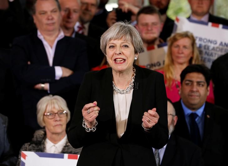 © Reuters. Britain's Prime Minister Theresa May delivers a speech to Conservative Party members to launch their election campaign in Walmsley Parish Hall, Bolton