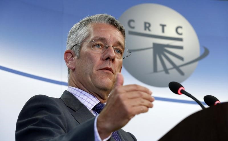 © Reuters. CRTC Chairman Jean-Pierre Blais speaks during a news conference in Gatineau