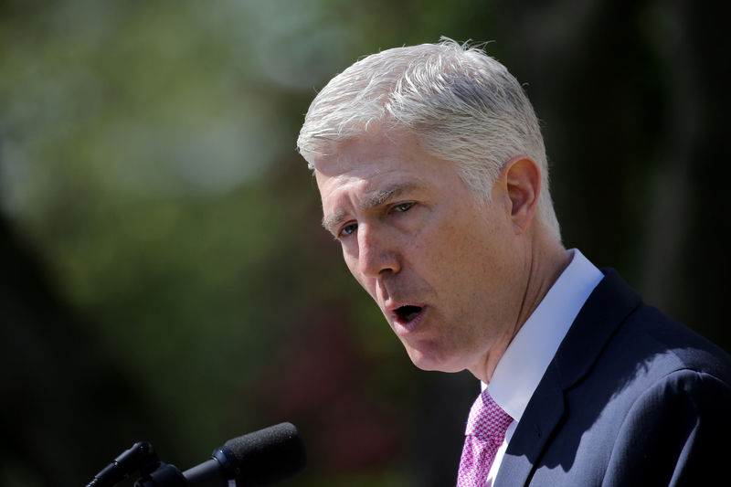 © Reuters. FILE PHOTO: Judge Neil Gorsuch speaks after his swearing as an associate justice of the Supreme Court in the Rose Garden of the White House in Washington