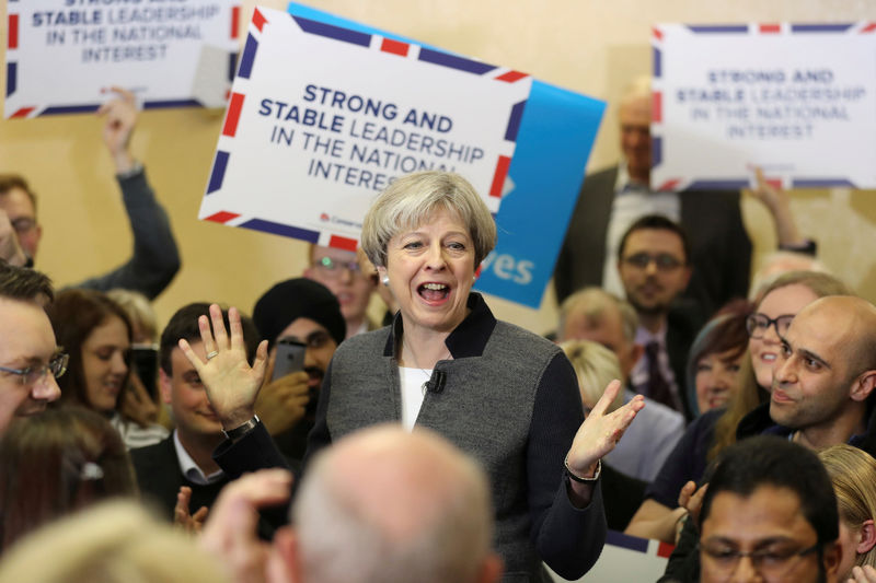 © Reuters. Britain's Prime Minster Theresa May delivers a stump speech at Netherton Conservative Club during the Conservative Party's election campaign, in Dudley