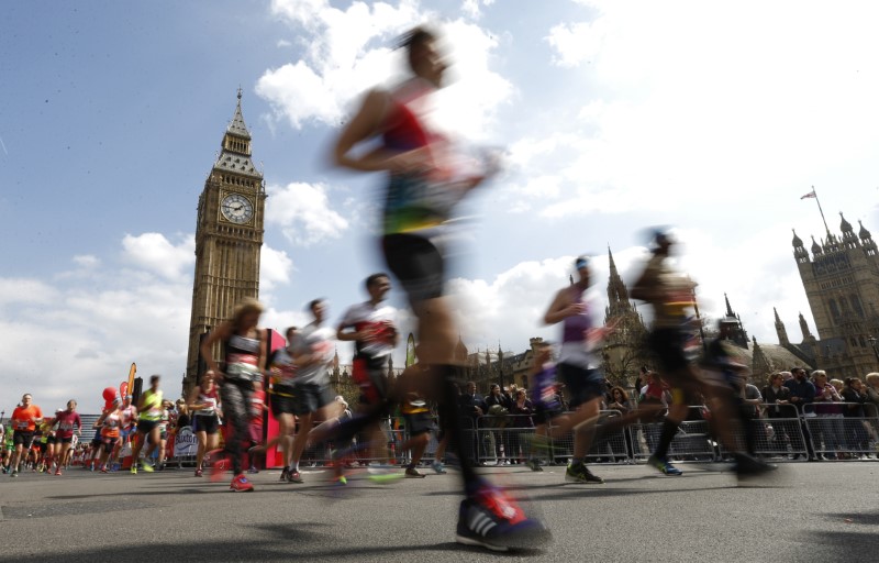 © Reuters. General view of runners at Westminster during the marathon