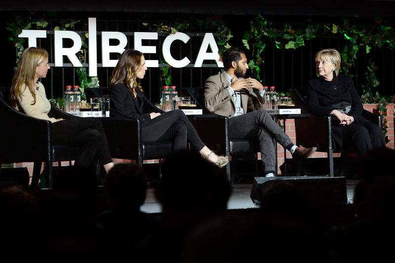 © Reuters. Former U.S. Secretary of State Hillary Clinton (R) joins guests Heydlauf of Africa Parks, Webber, of National Geographic Partners and director and writer Ismail attending Tribeca Film Festival panel discussion in New York