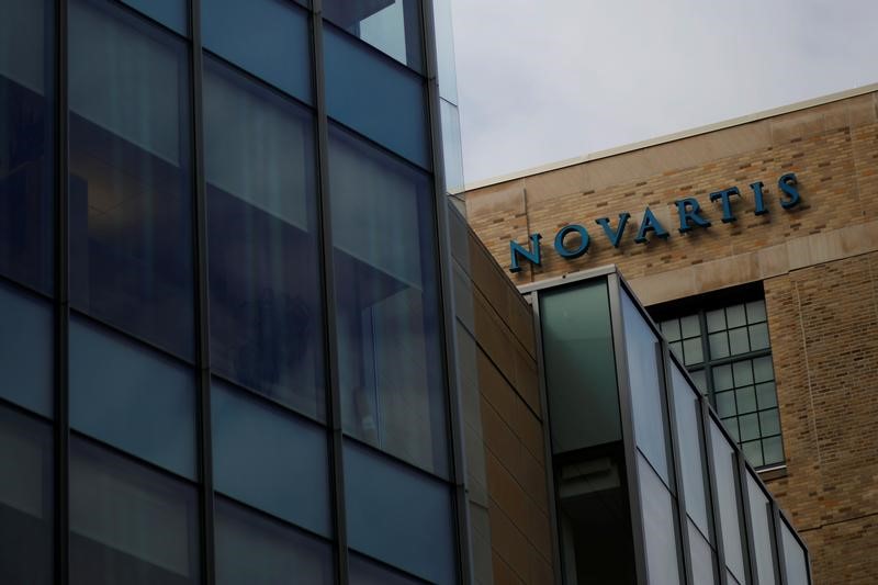 © Reuters. A sign marks a building on Novartis' campus in Cambridge