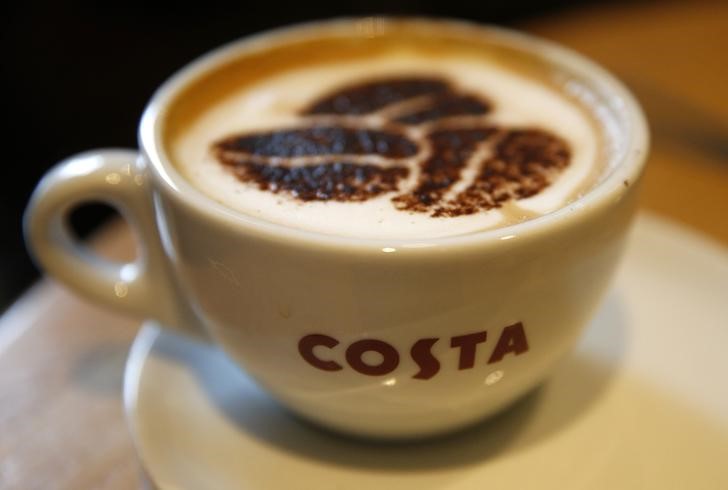 © Reuters. A Cappuccino stands on a table at a branch of Costa coffee in Manchester northern England.