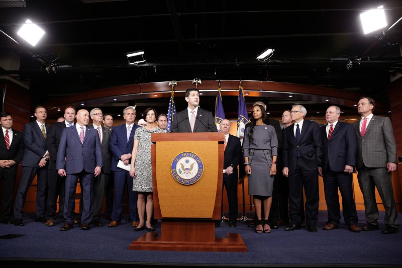 © Reuters. Speaker of the House Paul Ryan (R-WI) speaks about healthcare reform with House Republicans during a press briefing on Capitol Hill in Washington