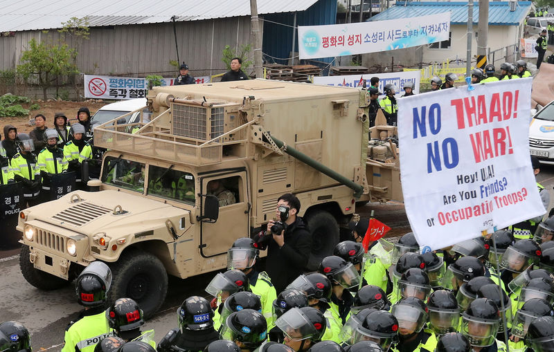 © Reuters. A U.S. military vehicle which is a part of Terminal High Altitude Area Defense (THAAD) system arrives in Seongju