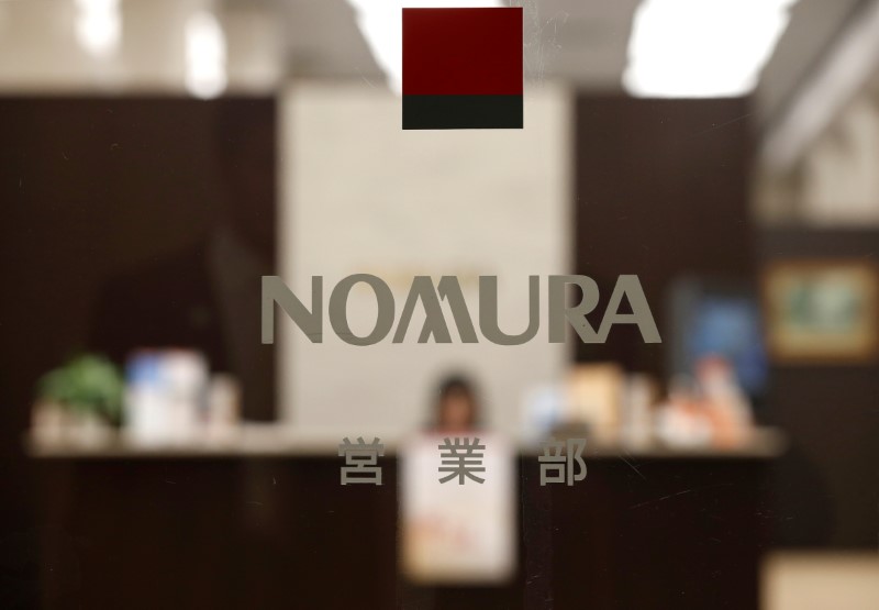 © Reuters. Logo of Nomura Securities is seen at the company's Head Office in Tokyo